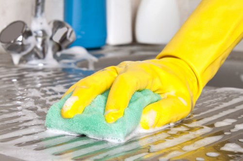 Deep cleaning a lounge sofa with specialist equipment